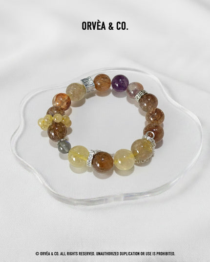 Custom Crystal Bracelet - with Amethyst Phantom Quartz, Golden Rutilated Quartz, Grey Moonstone & Black-Gold Super Seven Quartz - [Standard]