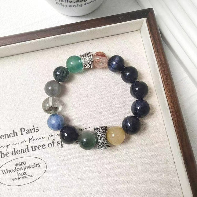 Custom Crystal Bracelet - with Blue Tiger’s Eye, Green & Golden Rutilated Quartz, Kyanite, Black-Gold Super Seven Quartz, Grey Moonstone & Green Phantom Quartz - [Standard]