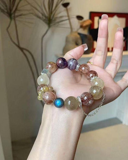 Custom Crystal Bracelet - with Amethyst Phantom Quartz, Golden Rutilated Quartz, Grey Moonstone & Black-Gold Super Seven Quartz - [Standard]